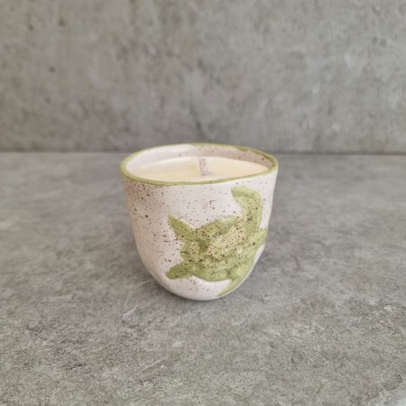 candle in cup green turtle