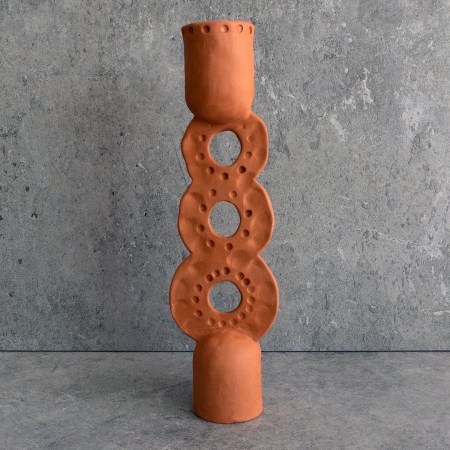 Handcrafted ELEVATED STATEMENT CANDLE HOLDER from terracotta, featuring an elevated design that adds sculptural elegance to any table or shelf.